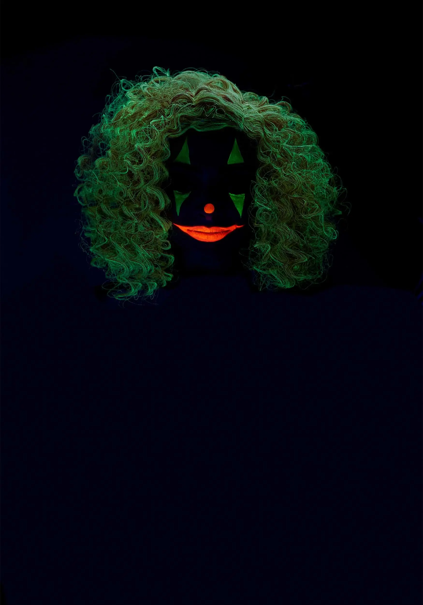 California Costume Collection Bright Red Glow In The Dark Curly Clown Wig 4 California Costume Collection Bright Red Glow In The Dark Curly Clown Wig - Image 4